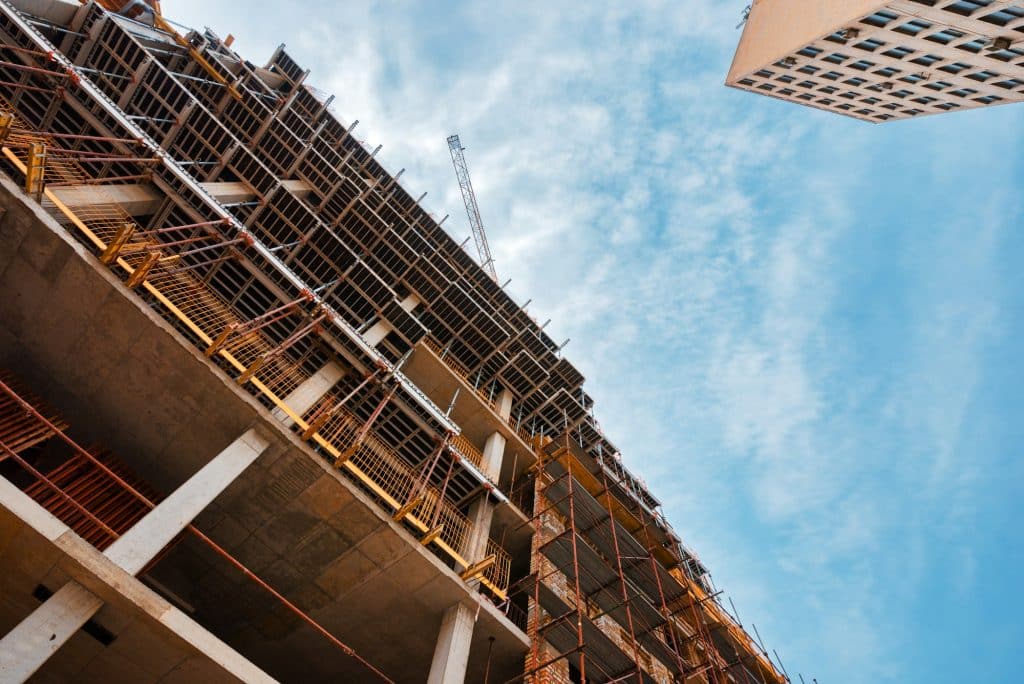 Building construction site with scaffolding